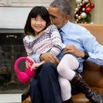 صورة لأوباما مع طفلة تثير لغطاً مريباً.. ما القصة؟